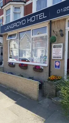 a hotel with flowers in the window of a building at Langroyd Hotel in Blackpool
