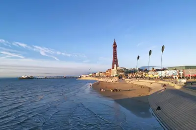 a view of a beach with the eiffel tower at White Moon Hotel in Blackpool
