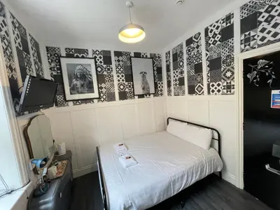 a small room with a small bed in it at Elmora House in Blackpool