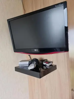 a flat screen tv sitting on a shelf at elbry in Heysham