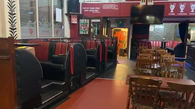a restaurant with chairs and tables and a dining room at Brownlows Inn Guest House formerly The King Harry Accommodation in Liverpool