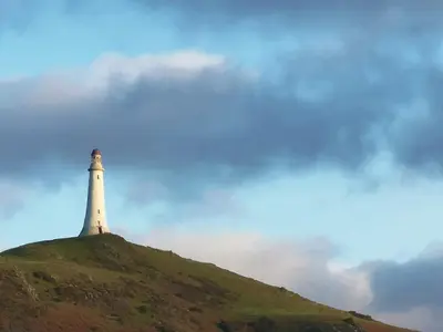 a lighthouse sitting on top of a hill at Saltcotes Farm in Ulverston