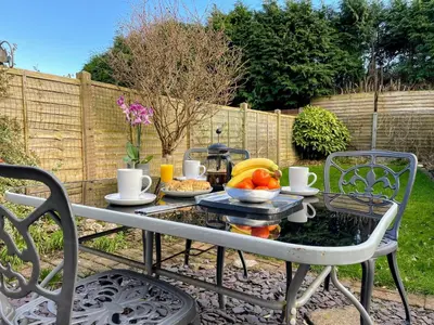 a table with a tray of fruit on it at Bare, Morecambe - Parking EV, 2 Bathrooms, 3 King Bedrooms, Good Area in Morecambe