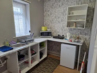 a kitchen with a sink and a counter top at Number 36 in Blackpool