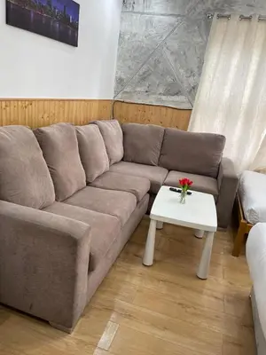 a living room with a couch and a table at Ariana House Hotel-Families and Couples Only in Blackpool