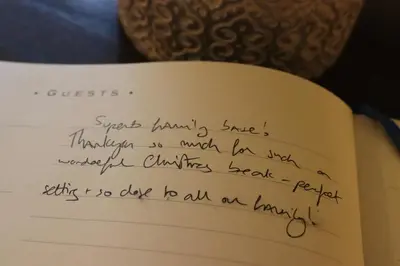 a letter written in handwriting on a book at Bowland Breaks - Cobble View Cottage with Private Parking Near all the local Wedding Venues in Waddington