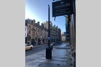 a sign for the university of london on a street at Superb City Centre Location in Liverpool