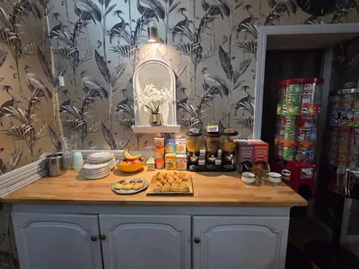 a table with food and drinks on top of it at The Rockley Hotel in Blackpool