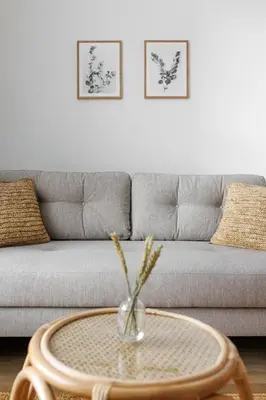 a living room with a couch and a table at 44 Renshaw Apart Hotel in Liverpool