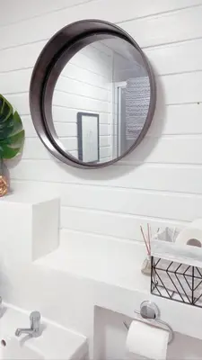 a bathroom with a mirror above a sink at Avril Apartments by CityNest1 in Blackpool