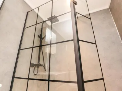 a glass elevator in a room with a floor at Henry Haven in Preston