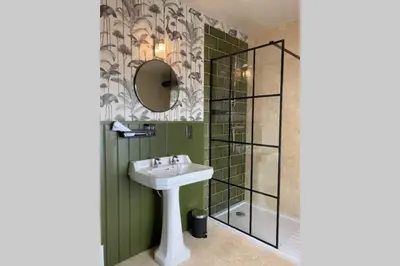 a bathroom with a sink and a shower at Mayfield Apartment Luxury first floor 1 bedroom apartment in Great Eccleston