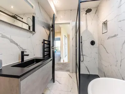 a bathroom with a sink and a shower at Dewhurst Farm in Langho