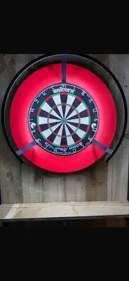 a dart board on top of a wooden wall at Blackpool Abode - The Cinema House in Blackpool