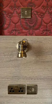 a door with a bell on top of it at Eden Vale First Floor Sea View Apartment in Morecambe