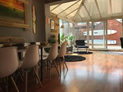 a dining room with a table and chairs at The Beach House South - Blackpool - Entire Holiday Home in Blackpool