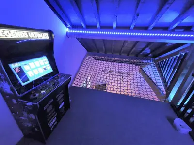 an aerial view of a video game system in a room at The Eden Warehouse - Gold Apartment, sleeps 6 in Southport