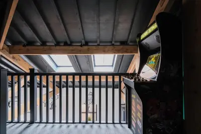 an overhead view of a staircase in a building at The Eden Warehouse - Green Apartment, sleeps 5 in Southport