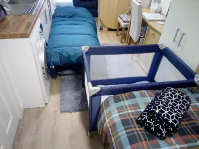a small room with a bunk bed in a kitchen at The Staithe by the Canal. in Lancaster