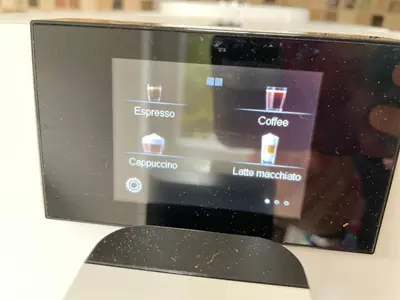 a computer monitor sitting on a table with a keyboard at Spacious City Centre Property in Lancaster