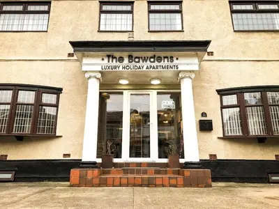 a store front of a building with the jewslynobby apartments at The Bawdens Holiday Apartments in Blackpool