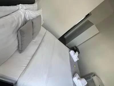 a close up of a bed in a hotel room at Alexandra Hotel in Blackpool