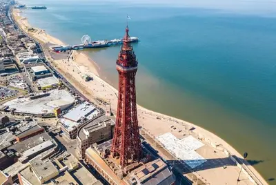 an aerial view of the eiffel tower next to the ocean at Alexandra Hotel in Blackpool