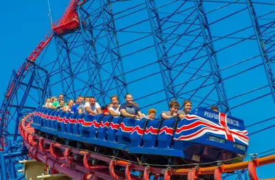 a group of people riding on a roller coaster at Alexandra Hotel in Blackpool
