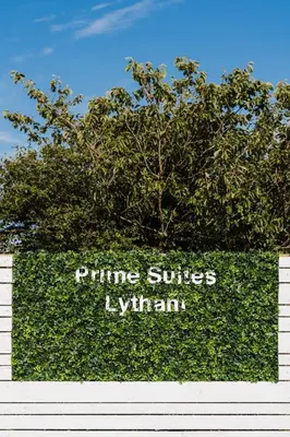 a hedge with the words prime suites hyuana at Prime Suites Lytham in Lytham St Annes