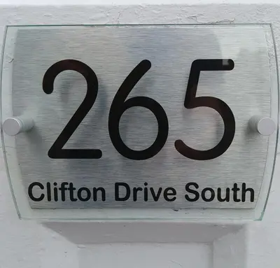a sign on a wall that reads citizen drive south at St Annes Lodge Apartments, Lytham St Annes in Lytham St Annes