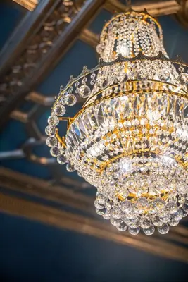 a large chandelier hanging from a ceiling at 62 Castle Street Hotel in Liverpool