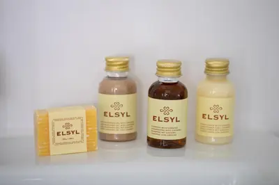 a group of four bottles of honey and a box at Ribble Valley Retreat in Langho