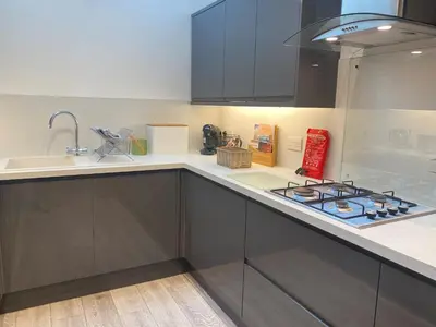 a kitchen with a stove and a counter top at Eagles Cottage, 3 - Bed, Sleeps 6, Pets Welcome - Ulverston in Ulverston