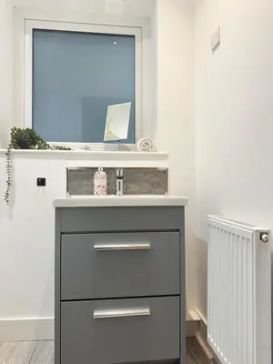 a bathroom with a sink and a mirror at Eagles Cottage, 3 - Bed, Sleeps 6, Pets Welcome - Ulverston in Ulverston