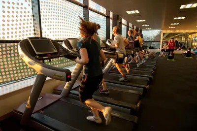 a group of people running on treadmills in a gym at Lancaster University in Lancaster