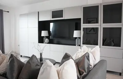 a living room with a couch and a tv at NOVU Apartments Duke Street Liverpool in Liverpool