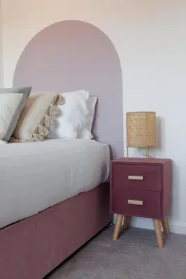 a bedroom with a bed and a nightstand with a lamp at Everton Valley House - Air Host & Stay - Close to city centre in Liverpool
