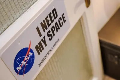 a door with a nasa sign on it at Pier View House in Blackpool