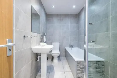 a bathroom with a sink and a toilet and a shower at Host & Stay - The Georgian Quarters at Canning in Liverpool
