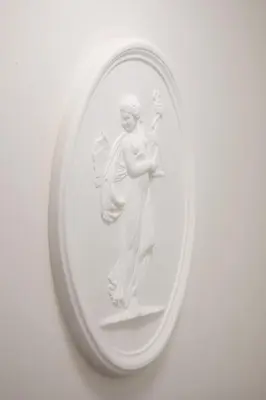 a white resin angel figurine in a ring at The Adonis Hotel in Blackpool