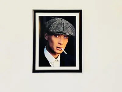 a picture of a man with a cigarette in his mouth at Peaky blinders apartment 5 min walk to Blackpool tower sleeps up to 14 in Blackpool