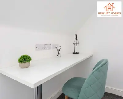 a white desk in a room with a green chair at Modern Townhouse - Free Gated Parking - City Centre - 5 ! By Hinkley Homes Short Lets & Serviced Accommodation in Liverpool