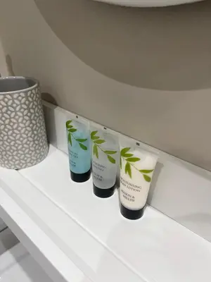 a row of four products sitting on a shelf at Avondale, Lytham - Unique and luxury apartment in the heart of Lytham in Lytham St Annes