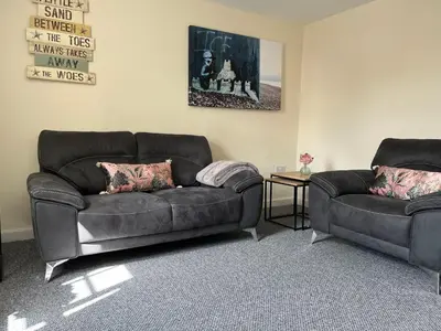 a living room with two couches and a couch at Winter Gardens North Pier 2 Bed in Blackpool