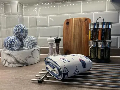 a kitchen counter with a cutting board and a knife at Room 4 (8 Holland Street) in Liverpool