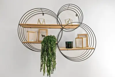a heart shaped shelf with a plant on a wall at The Treehouse at The Hideaway STAMP SA in Blackpool