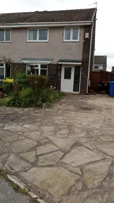 a house with a stone driveway in front of it at Beeston House in Thornton