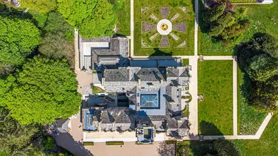 an overhead view of a house with a garden at The Kennedy House Stone Cross Mansion in Ulverston
