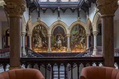a room with a painting on the wall at William Tower Suite Stone Cross Mansion in Ulverston