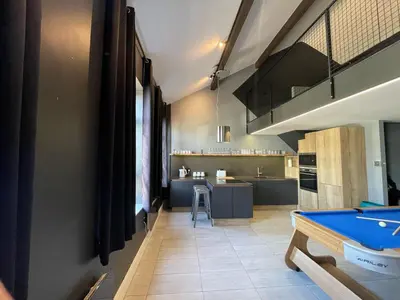 a kitchen with a pool table in a room at The Luxury Penthouse by Sasco Apartments in Blackpool